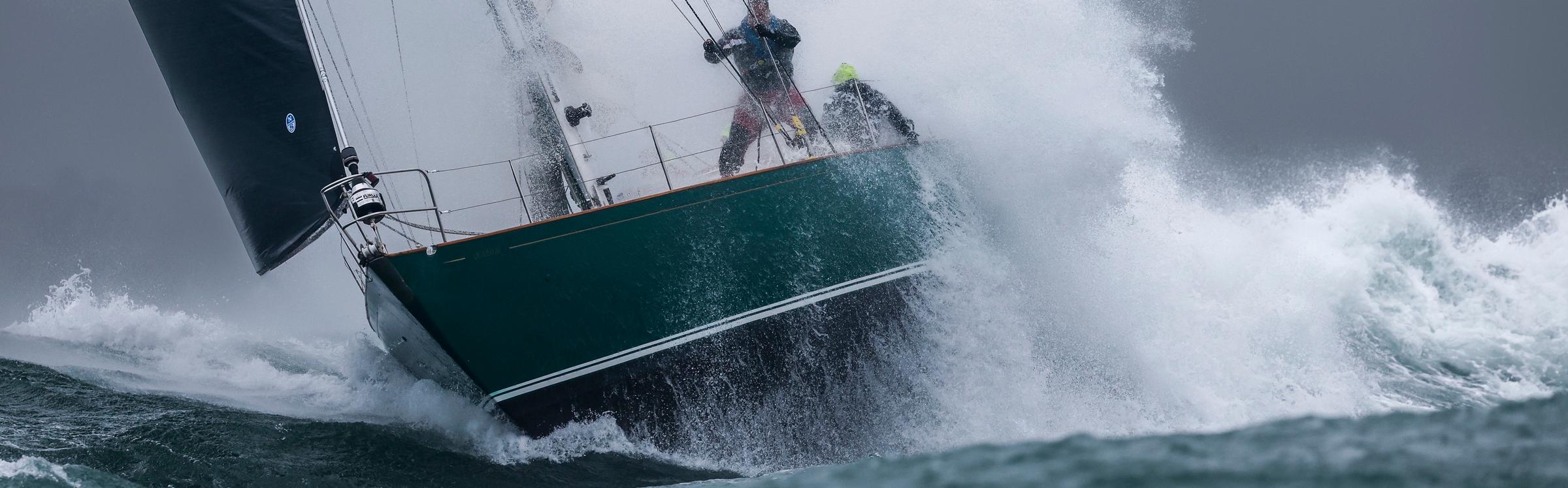 Andrew Tseng’s classic Nicholson 55, Quailo III battles the brutal conditions at the start of the 2023 Rolex Fastnet Race © Paul Wyeth