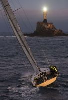 Overall winner, Rán, at the Fastnet Rock. Photo: Rolex / Carlo Borlenghi