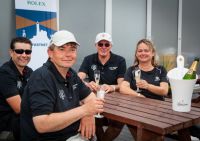 Swan 60, Petite Flamme crew enjoying a glass of Lanson Champagne after finishing the 45th Rolex Fastnet Race. RORC/Tom Gruitt