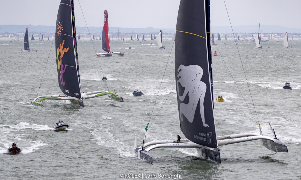 Four massive 32m long Ultim trimarans led the charge © Rolex/Carlo Borlenghi