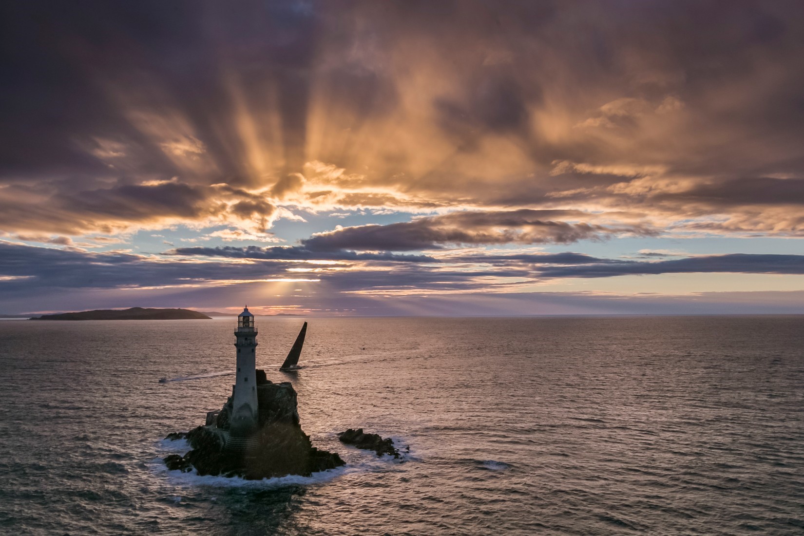 Nikata passes the Fastnet Rock at sunrise in the 2017 edition of the race © Rolex/Carlo Borlenghi
