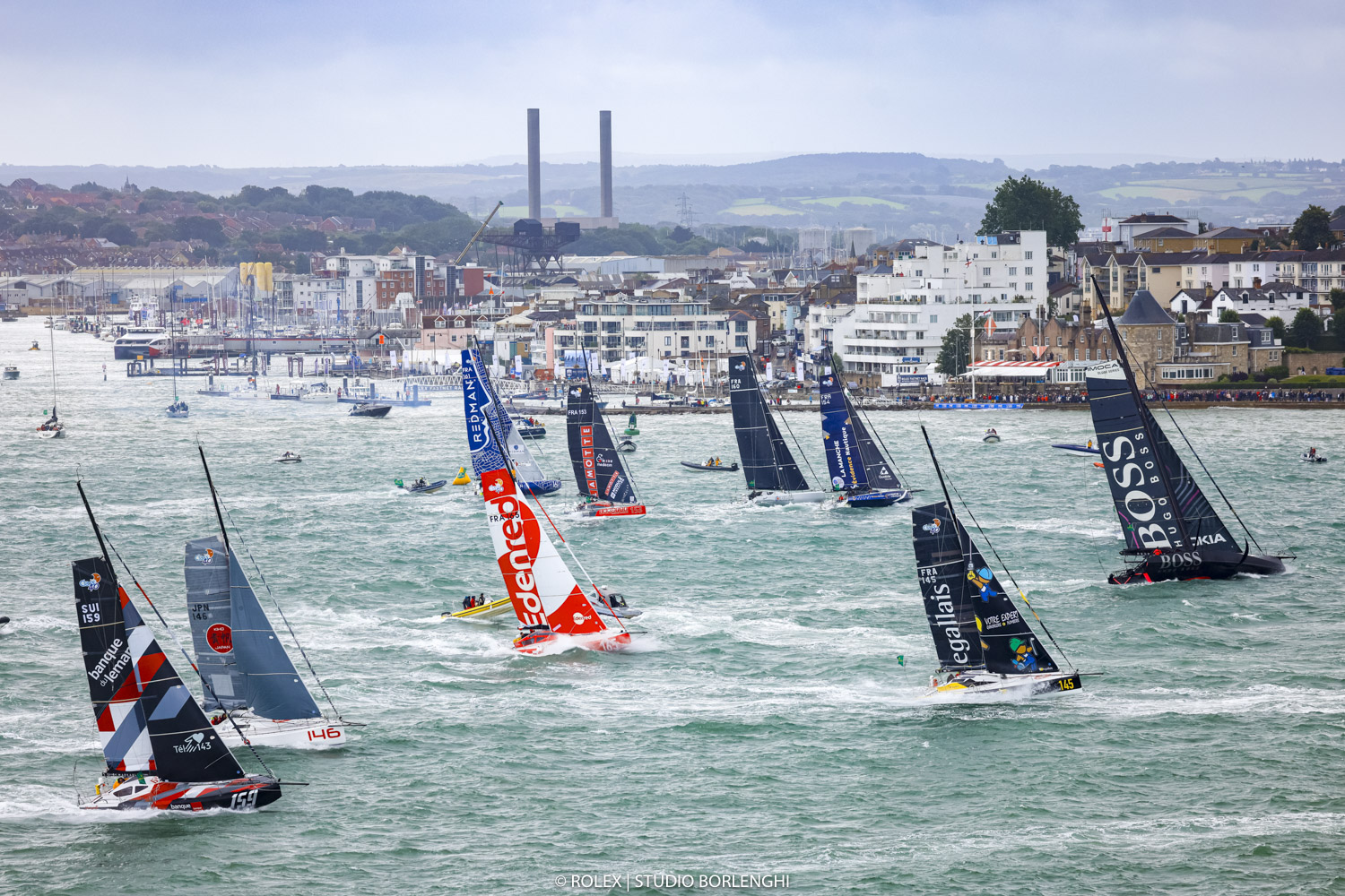 IMOCA 60 and Class40 start off the Royal Yacht Squadron, Cowes in the Rolex Fastnet Race © Carlo Borlenghi/Rolex