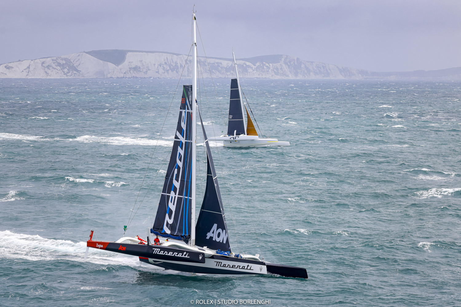 Giovanni Soldini's Multi70 Maserati and Jason Carroll's MOD 70 Argo exit the Solent © Carlo Borlenghi/Rolex