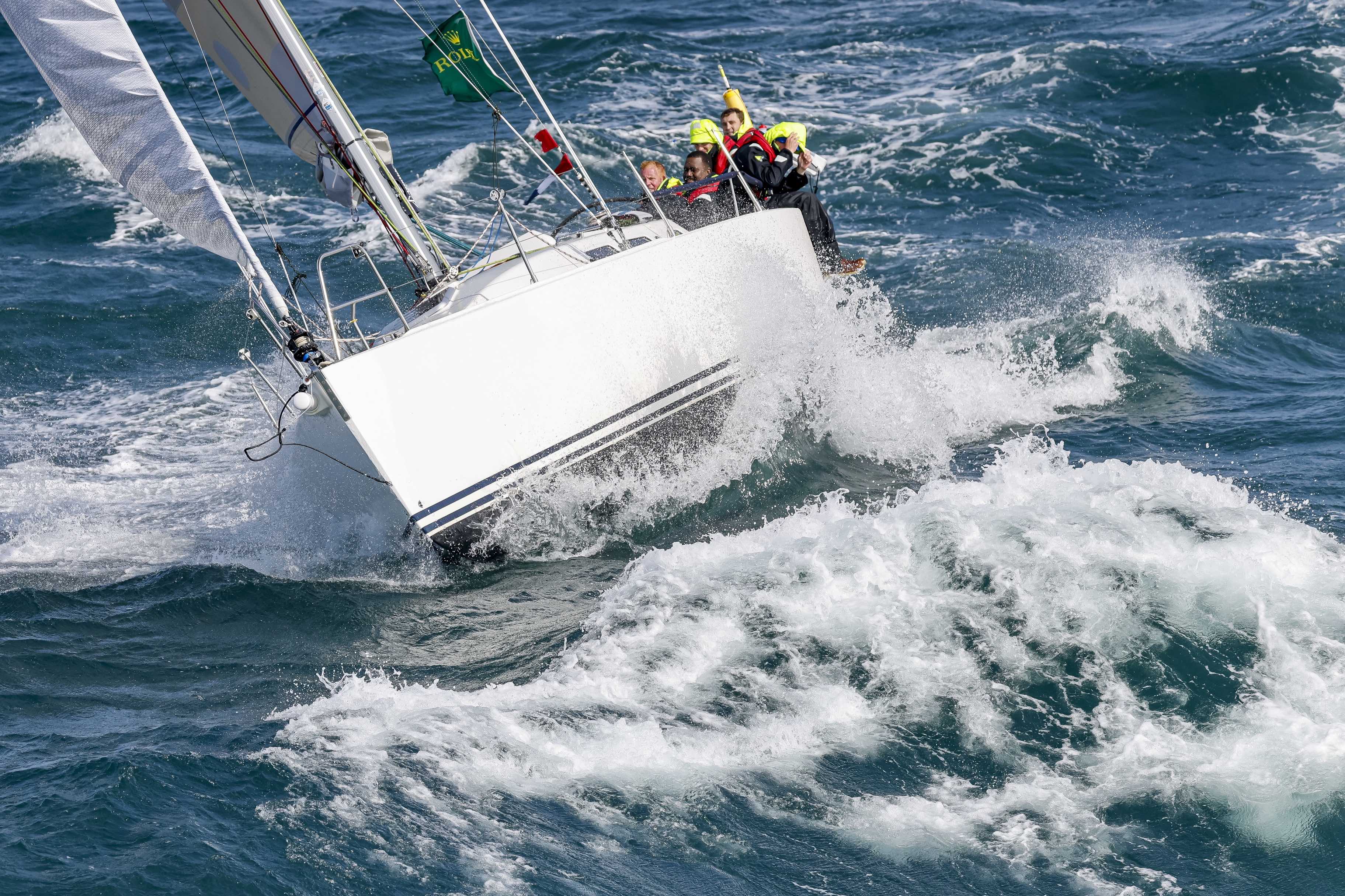 Trojan, sailed by the Royal Engineers Yacht Club, also competed in 2021's similarly blustery race © ROLEX/Carlo Borlenghi