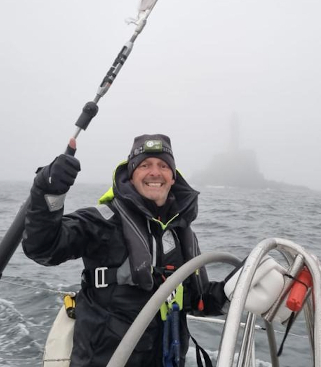 A poignant moment for Will Le Fevre Jr on board Kali as he rounds the Fastnet Rock in memory of his late father, Bill Le Fevre