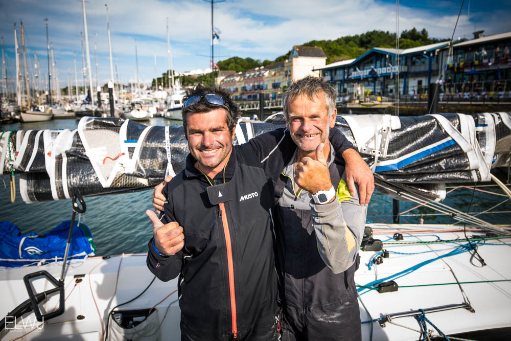 Pascal and Alexis Loison, father and son racing doublehanded in IRC Four on Night and Day, celebrating their finish in Plymouth. Credit: ELWJ Photography/RORC