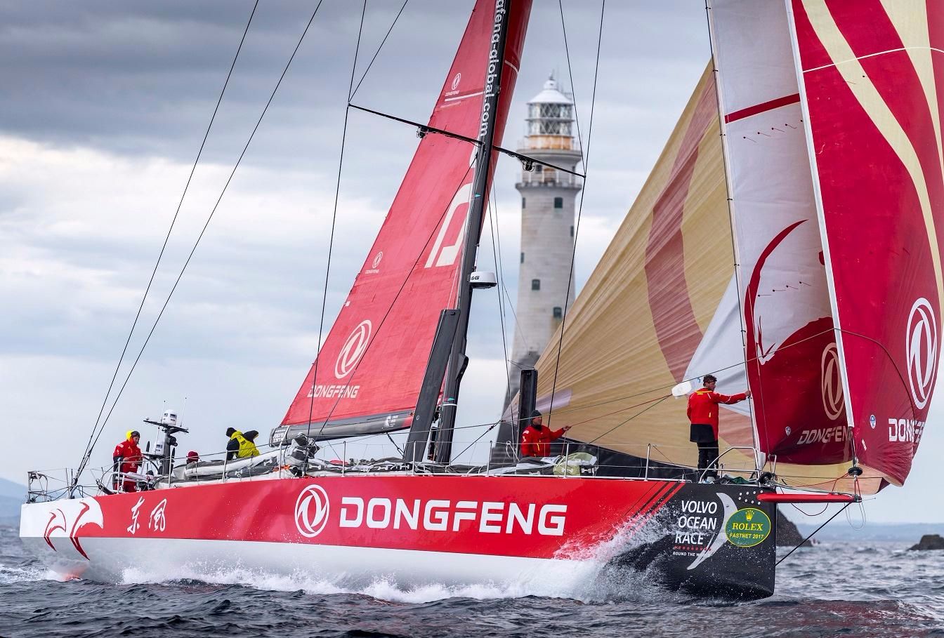 VO65 Dongfeng are the first of their class to round the Fastnet Rock. Credit: ROLEX/Kurt Arrigo
