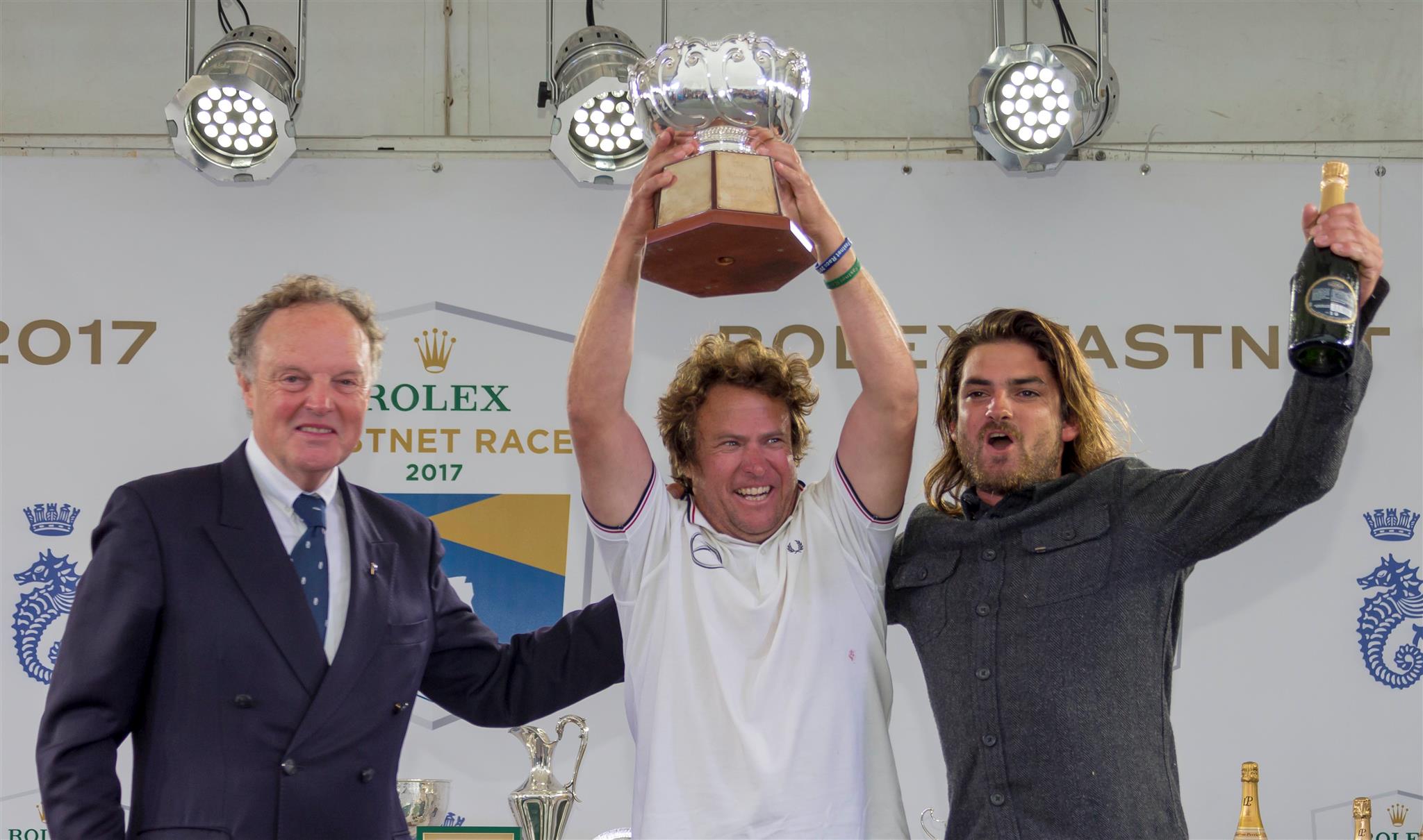 The team from Italy and Chile onboard Swan 57, Equinoccio, celebrate their awarding of the Coates Schofield Trophy. Credit: ROLEX/Carlo Borlenghi