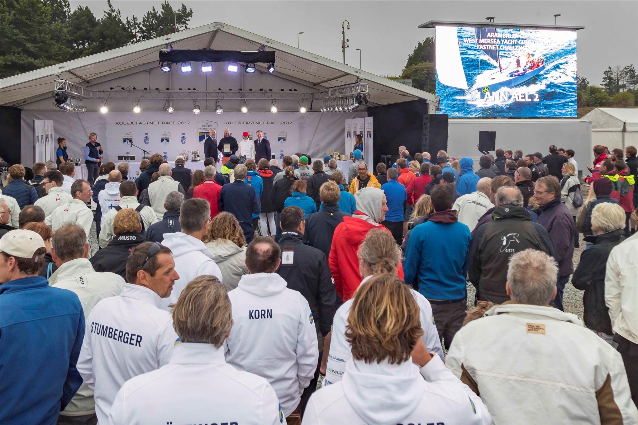 The crowds gathered in the Rolex Race Village for the prizegiving on Friday night, the presentation bookended by the thrilling video footage of the race. Credit: ROLEX/Carlo Borlenghi