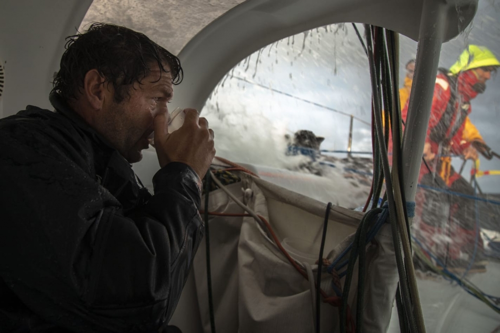 Crew on Bretagne Telecom enjoy a cup of tea out of the cold and wet in this bumpiest of races 