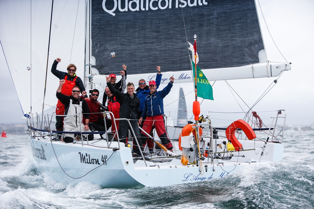 The crew of L'Ange De Milon, Jacques Pelletier's Milon 41, celebrate a well-executed Rolex Fastnet Race © Paul Wyeth/www.pwpictures.com