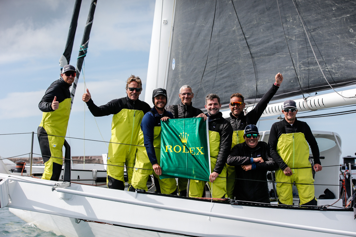 Team Argo celebrate at the finish: Pete Cummings, Jason Carroll, Charlie Ogletree, Thierry Fouchier, Charles Corning, Weston Barlow, Alister Richardson and Brian Thompson © Paul Wyeth/pwpictures.com