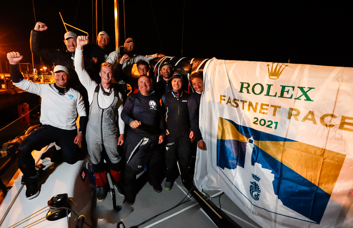 Dockside celebrations as RORC Commodore James Neville and crew on his HH42 Ino XXX finish the Rolex Fastnet Race in Cherbourg and lead IRC One © Paul Wyeth/pwpictures.com